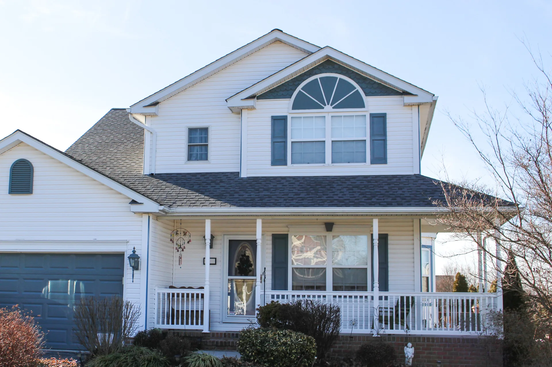 Completed roof on a two-story home with an arched window in York County, PA by Cool Water Roofing